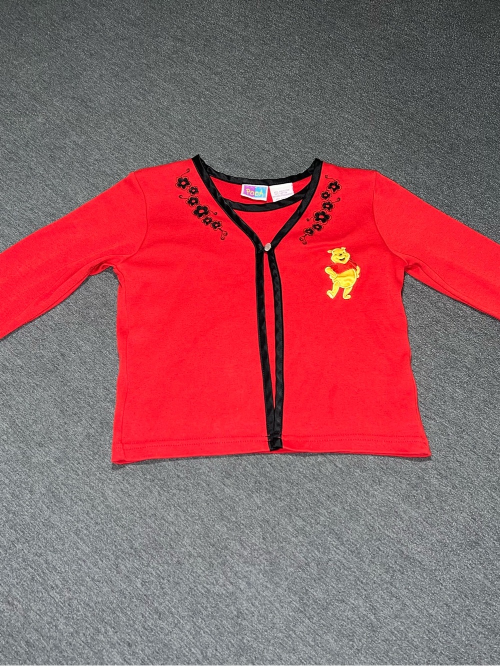 Girls' Red Long-Sleeve Top with Black Trim and Yellow Character Patch